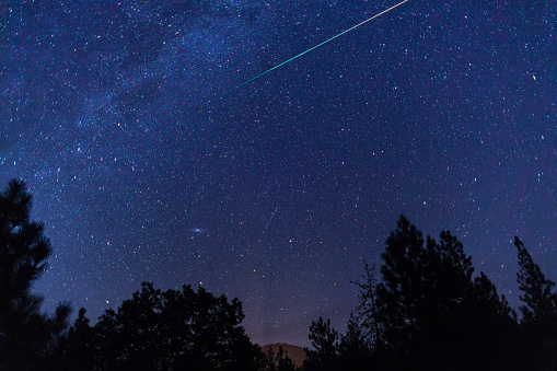 Perseid Meteors with the Milky Way Galaxy during the Perseids Meteor Shower. Oregon, Ashland, Cascade Siskiyou National Monument, Summer