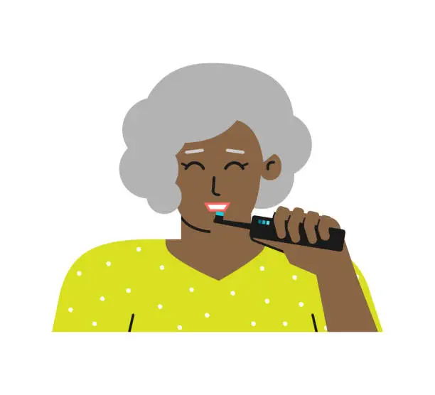 Vector illustration of Vector isolated flat illustration. Grey-haired african american senior woman is cleaning teeth by electric toothbrush to save its healthy. Daily dental routine to prevent caries, remove tartar, plaque