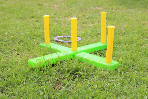 istock children's play ring toss on green grass 1266130672
