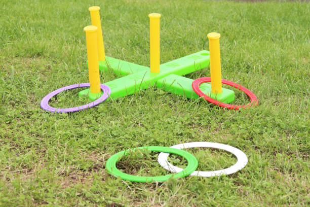 istock children's play ring toss on green grass 1266130673