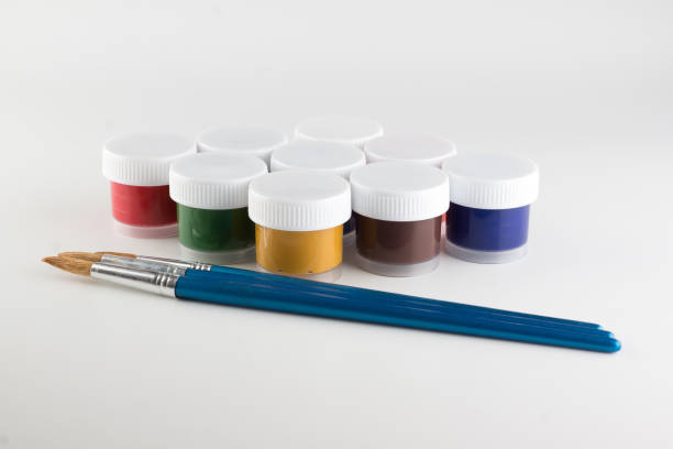 istock jars of colored paint for creativity 1266131582