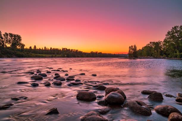 istock Colorful Sunrise Sky Over The Bow River 1266131842