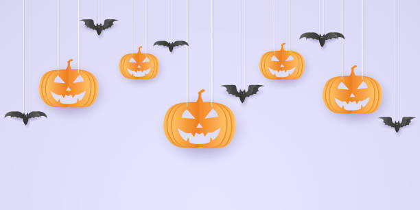 istock Halloween pumpkin and bat hanging,  paper art style 1266132033