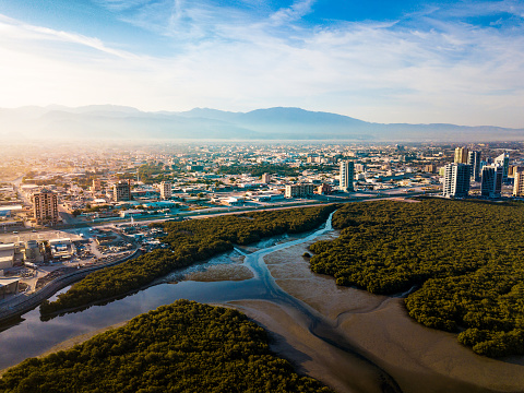 Aerial view of Ras al Khaimah over the mangroves and the creek in the United Arab Emirates at sunrise