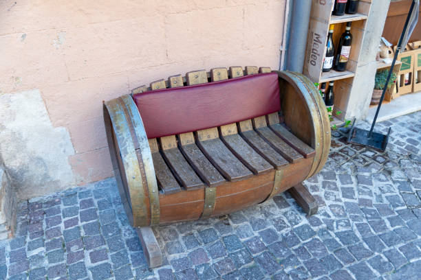montefalco,italy august 13 2020:Wooden barrel for wine build by hand as a bench