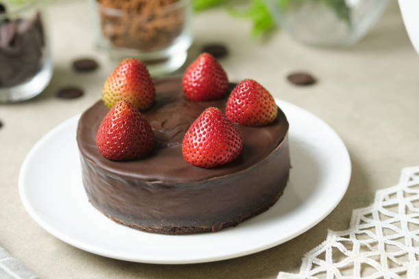 istock Mousse chocolate cake with strawberry. 1266134632
