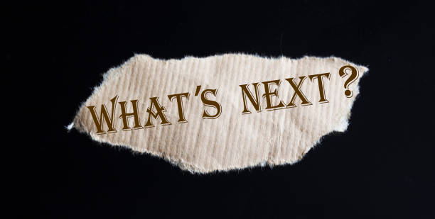 istock What's next The text is written on torn brown paper 1266134655