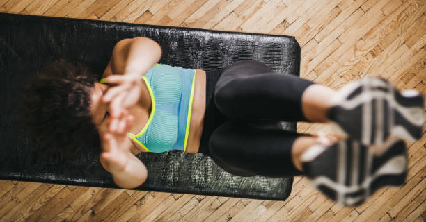 istock The girl laughs and enjoys stretching 1266139874