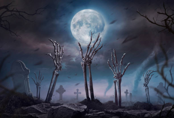 istock Zombie skeleton hand rising in dark Halloween night. 1266140542