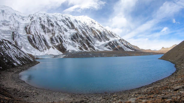 istock Tilicho Lake - A panoramic view on turquoise colored lake in Himalayas 1266143049