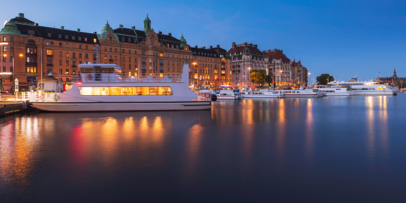 Evening view of Strandvägen and Nybroviken in central Stockholm, a hub for tourboats going out to various islands in the Stockholm archipelago.