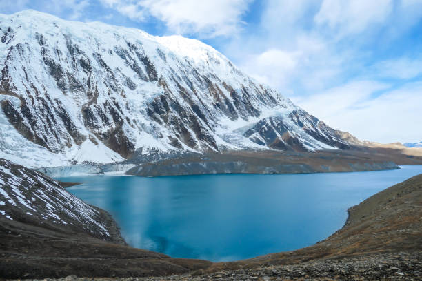 istock Tilicho Lake - A panoramic view on turquoise colored lake in Himalayas 1266144324