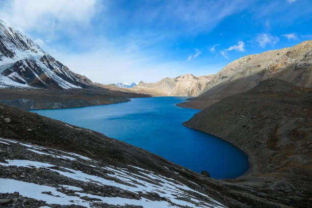 istock Tilicho Lake - A panoramic view on turquoise colored lake in Himalayas 1266144514
