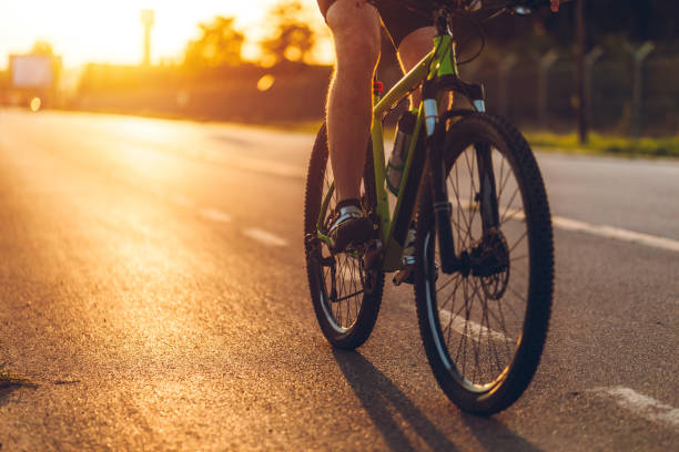 istock Cyclist foot on bicycle pedal 1266144560