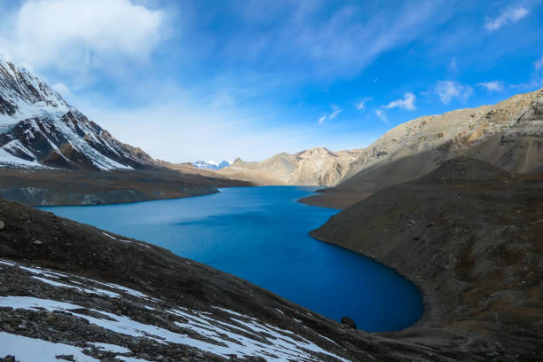 istock Tilicho Lake - A panoramic view on turquoise colored lake in Himalayas 1266144619