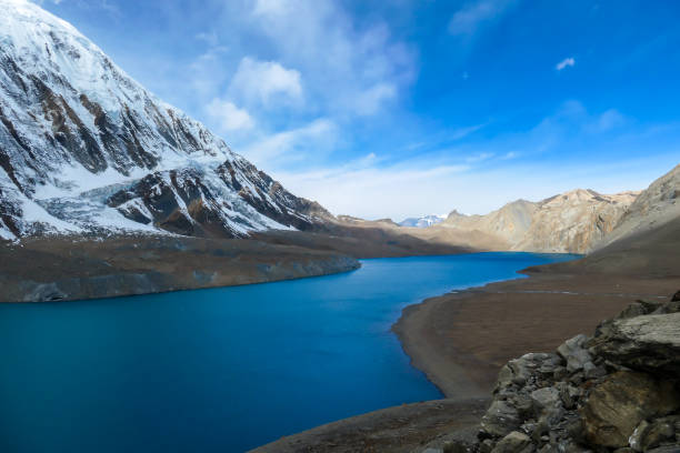 istock Tilicho Lake - A panoramic view on turquoise colored lake in Himalayas 1266144647