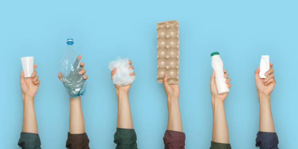 istock Concept of garbage sorting and ecology. Photo for website banner. Hands holding different trash 1266144766