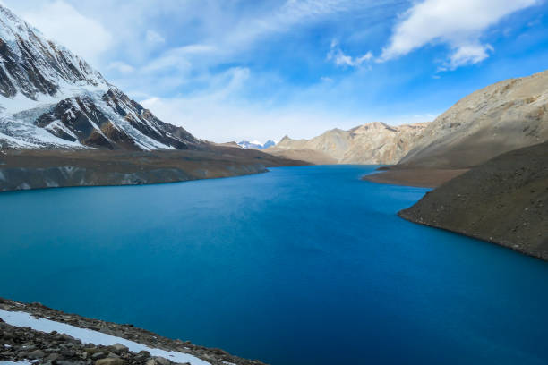 istock Tilicho Lake - A panoramic view on turquoise colored lake in Himalayas 1266145851