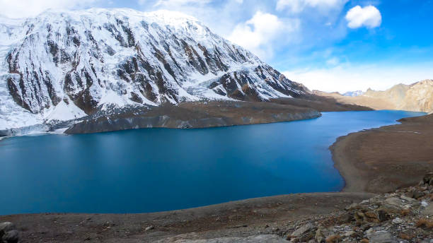istock Tilicho Lake - A panoramic view on turquoise colored lake in Himalayas 1266146411