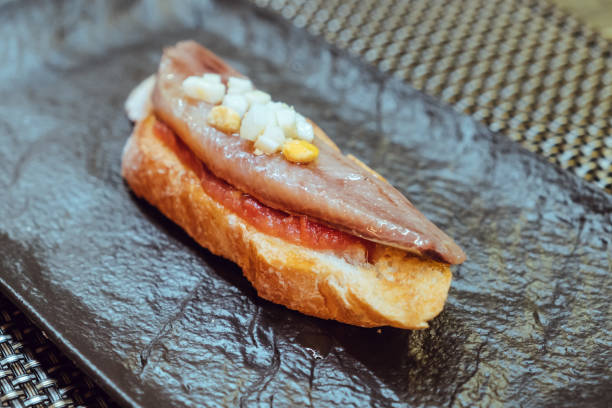 istock Sardine loin canape marinated with tomato 1266146691