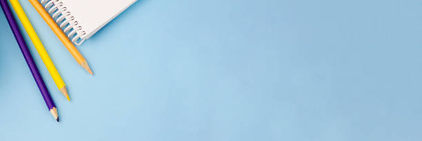istock Office supplies on a blue background. 1266150568