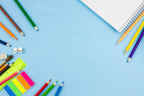 istock School supplies on a blue background. 1266151601