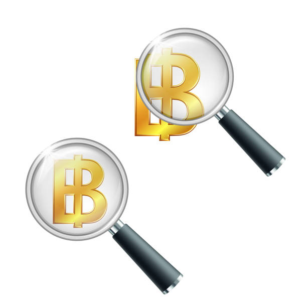 istock Thai baht golden currency symbol with magnifying glass. 1266154633