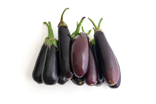 Three eggplants isolated on white background