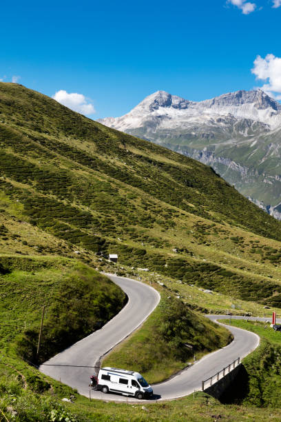 istock Motorhome Speeding on Alpine Road, Switzerland 1266157663