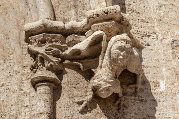 istock Gothic gargoyle bas relief on an ancient historical building in Valencia 1266160768