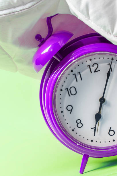istock Alarm clock under the pillow - Don't want to wake up concept 1266161824