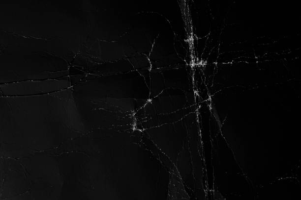 istock Background made of black crumpled paper 1266163879