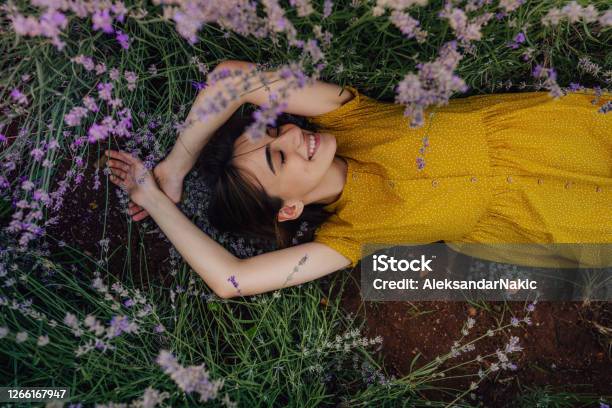 Into The Loving Arms Of Nature Stock Photo - Download Image Now - Women, Flower, One Woman Only
