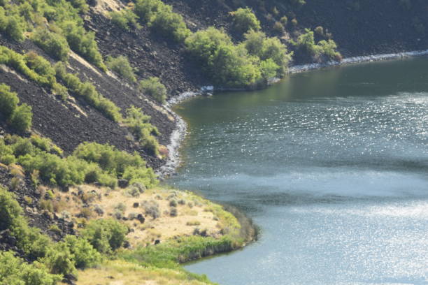 istock Lake Along Sloped Landscape 1266169504