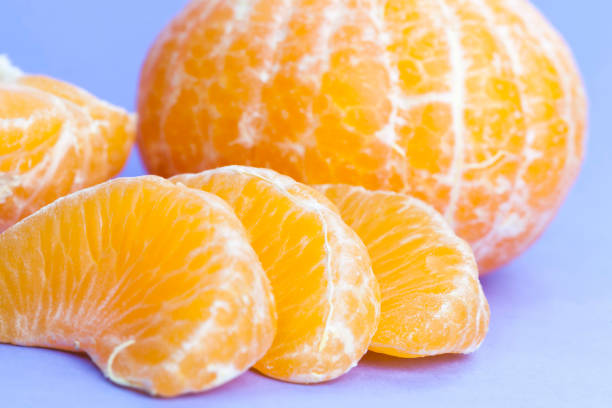 istock peeled delicious tangerine 1266171902