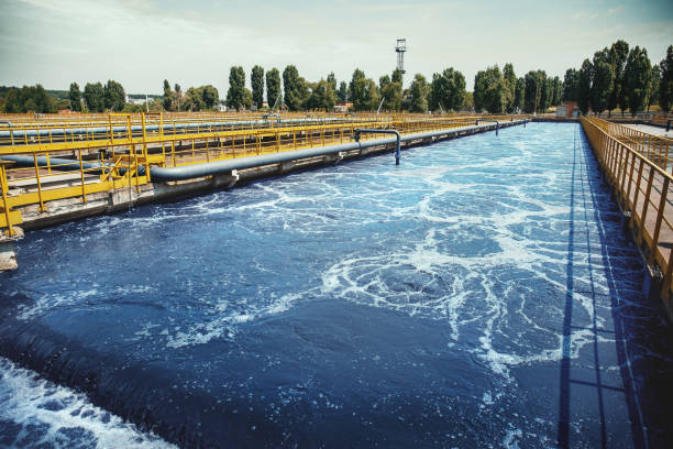 Wastewater treatment plant. Reservoir for purification of sewage Wastewater treatment plant. Reservoir for purification of sewage. reservoir stock pictures, royalty-free photos & images