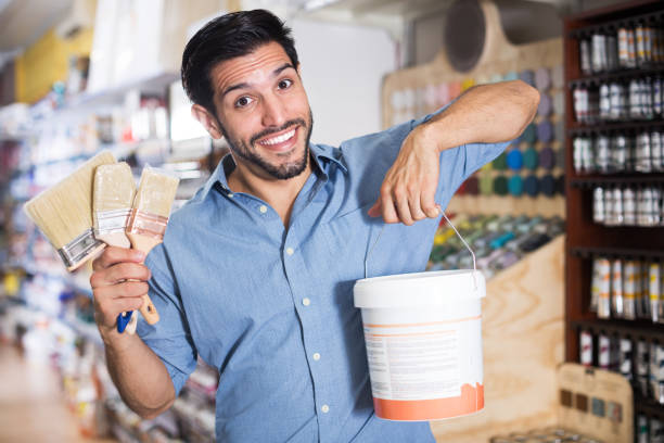 istock Male buyer in paint store 1266181833