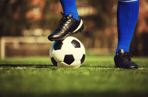 istock Soccer ball on green playground. Soccer concept 1266184821