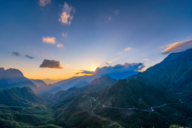 istock The magical sunset on O Quy Ho mountain pass before sunset. O Quy Ho Mountain Pass (Sapa, Vietnam) is Vietnam's longest mountain pass. 1266185607