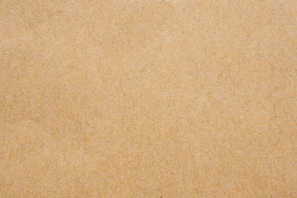 istock Brown paper eco recycled kraft sheet texture cardboard background 1266190233