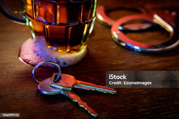 Alcohol Keys Handcuffs Stock Photo - Download Image Now - Driving Under The Influence, Pulled Over by Police, Beer - Alcohol