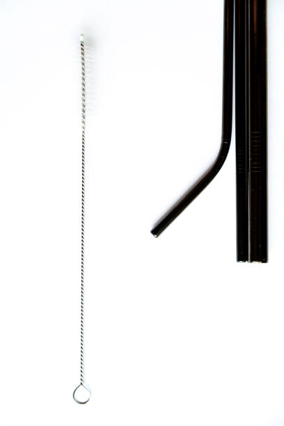 istock Black metal reusable straws for drinks on white background 1266200208