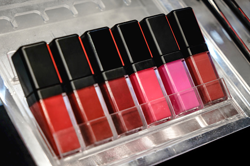 Photo of variation lipsticks selection in a beauty shop.