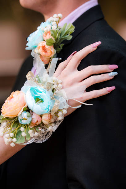 istock Young Couple Wearing Formalwear with Corsage 1266208400