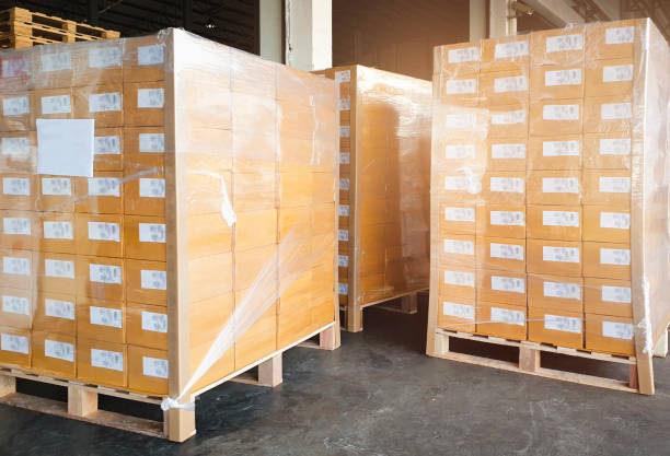 istock Shipment, Carton boxes, Cargo freight, Manufacturing warehouse storage. Stack of cardboard boxes or packages goods for delivering to a customer. 1266208483