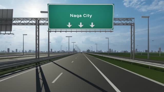 Naga City signboard on the highway conceptual stock video indicating the entrance to city