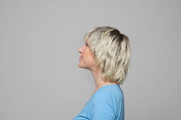 istock Side view of smiling woman 1266214230