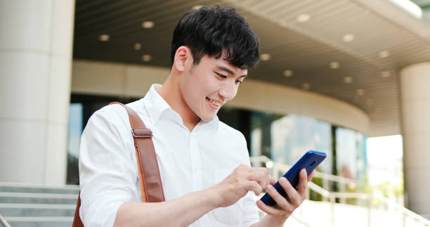 istock businessman use smart phone 1266215032