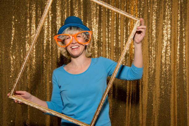 istock Woman standing with prop 1266215941