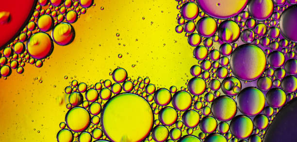 istock Abstract colorful bubbles. Mixing water and oil. Unrealistic colored bubbles, different color filters 1266215966